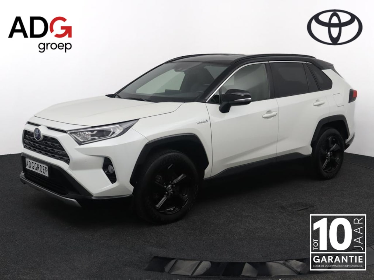 Toyota RAV4 - 2.5 Hybrid AWD Bi Tone | 1650 kg trekgewicht | Parkeercamera | Lederen bekleding | - AutoWereld.nl