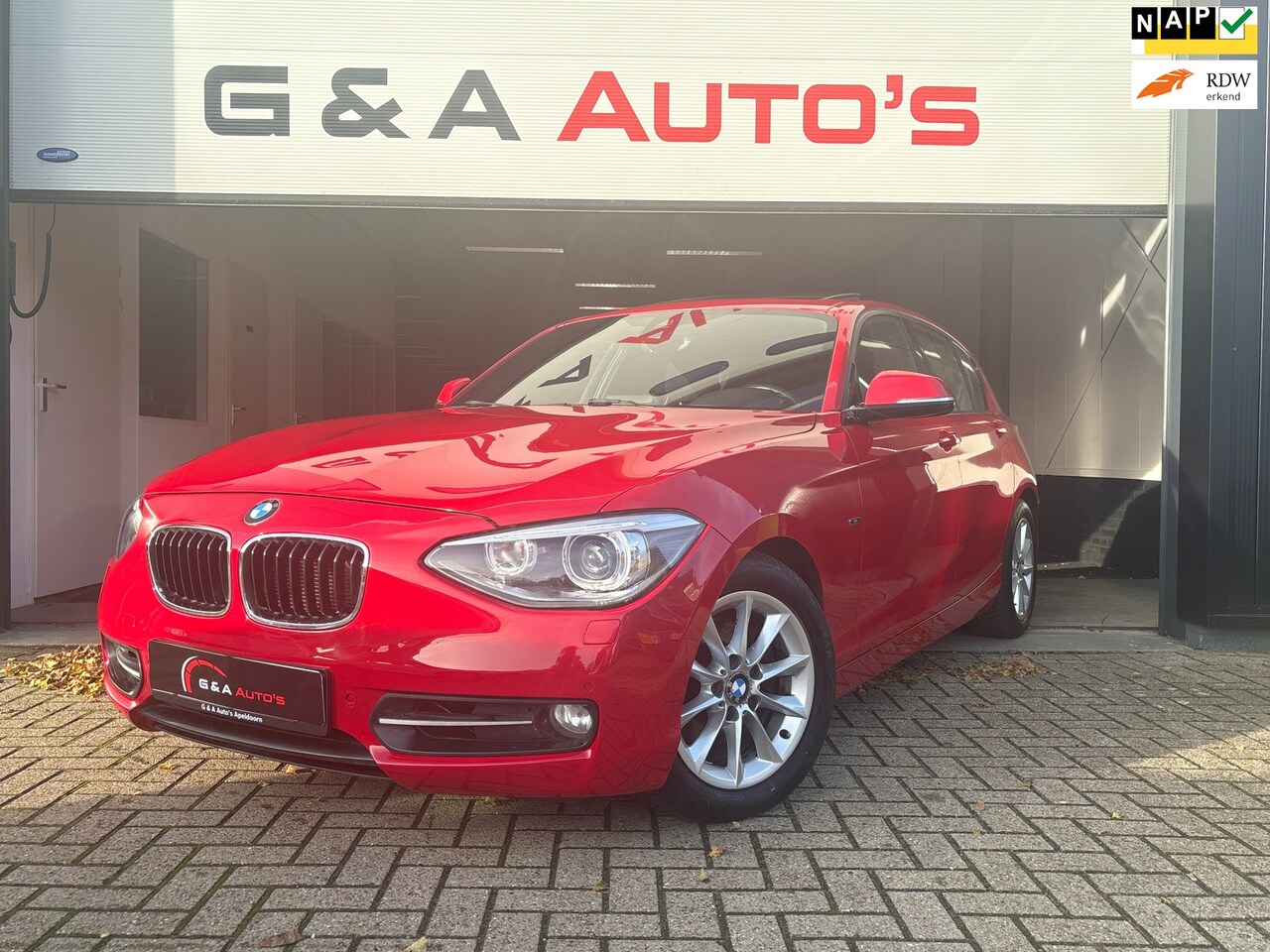 BMW 1-serie - 118i NAVI / SCHUIFDAK / CAMERA / PDC / VOL - AutoWereld.nl