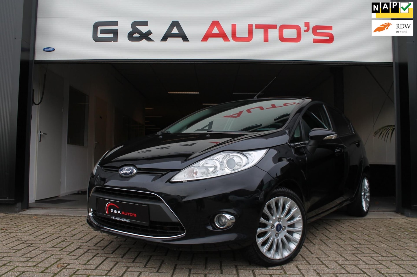 Ford Fiesta - 1.4 AIRCO / KEYLESS / PDC / STOELVERW / NW APK - AutoWereld.nl