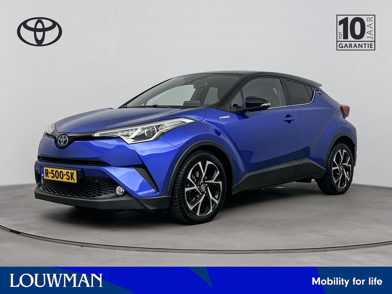 Toyota C-HR - 1.8 Hybrid Dynamic Bi-Tone Limited | Navigatie | LM velgen | Cruise Control Adaptief | - AutoWereld.nl