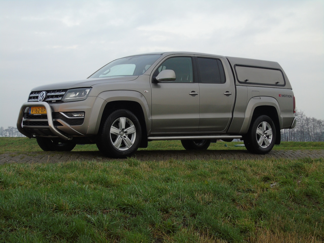 Volkswagen Amarok - 3.0 TDI 4Motion DC Highline V6  5-pers. grijs kenteken. - AutoWereld.nl