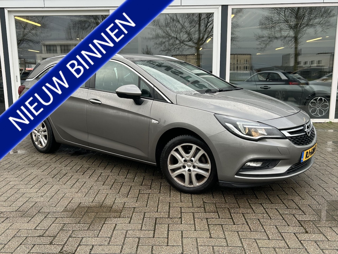 Opel Astra Sports Tourer - 1.0 Online Edition 50% deal 3.475,- ACTIE Cruise / Trekhaak / Navi / Clima - AutoWereld.nl