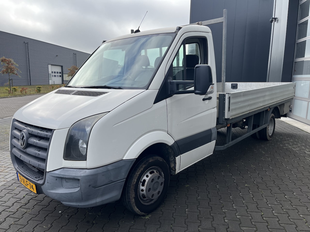 Volkswagen Crafter - 35 2.5 TDI L3 ✅ Open Laadbak ✅ Airco ✅ NAP ✅ 1ste eigenaar - AutoWereld.nl