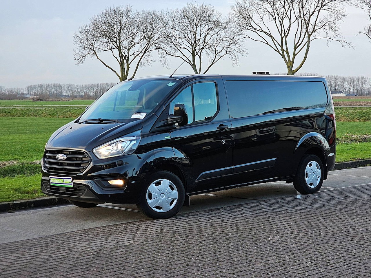 Ford Transit Custom - 320 2.0 TDCI L2H1 Trend BPM vrij! airco, navi, pdc, trekhaak - AutoWereld.nl