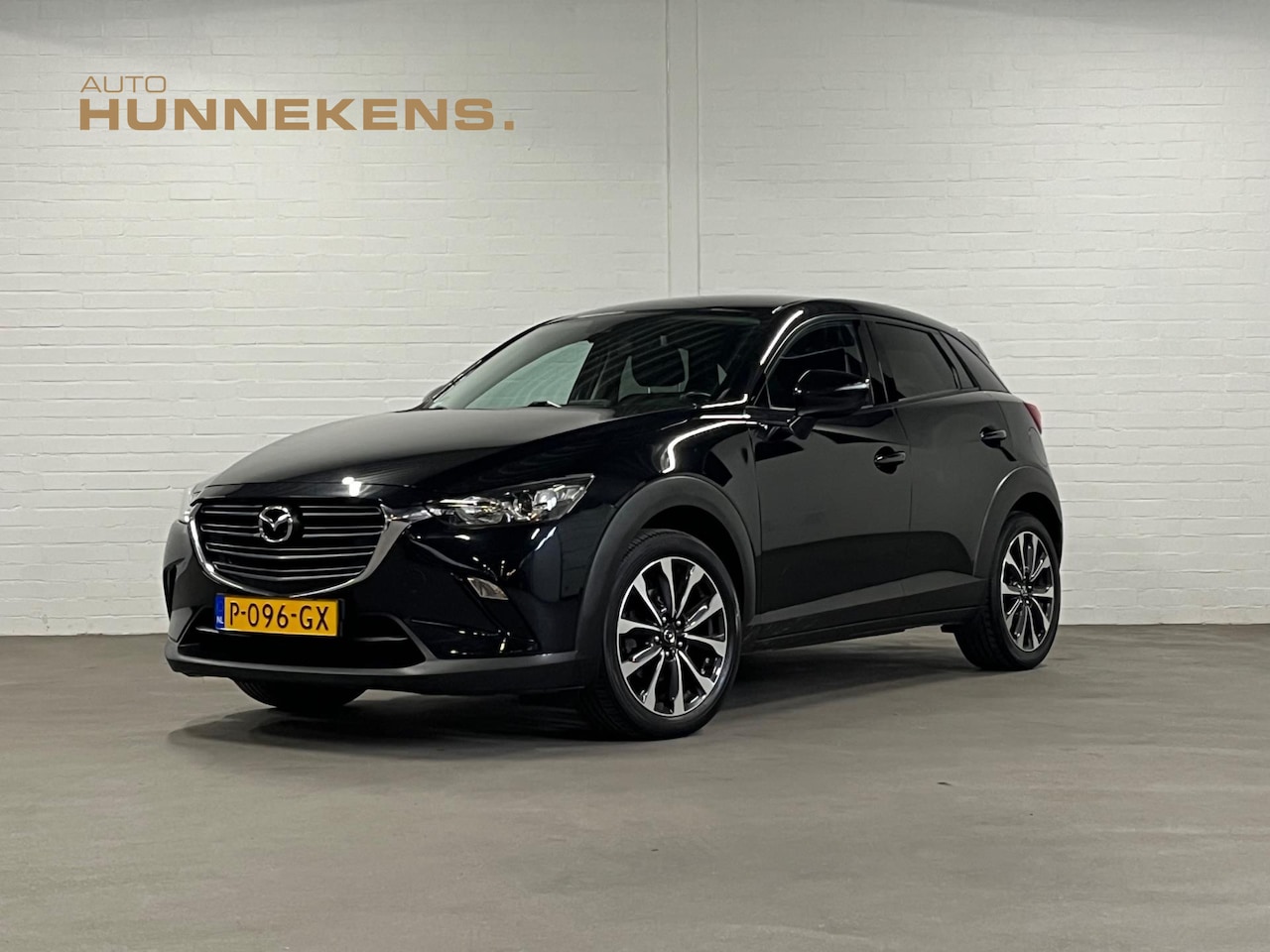 Mazda CX-3 - 2.0 Signature | Navigatie | Cruise & Climate c. | Parkeersensoren | Stoelverwarming - AutoWereld.nl