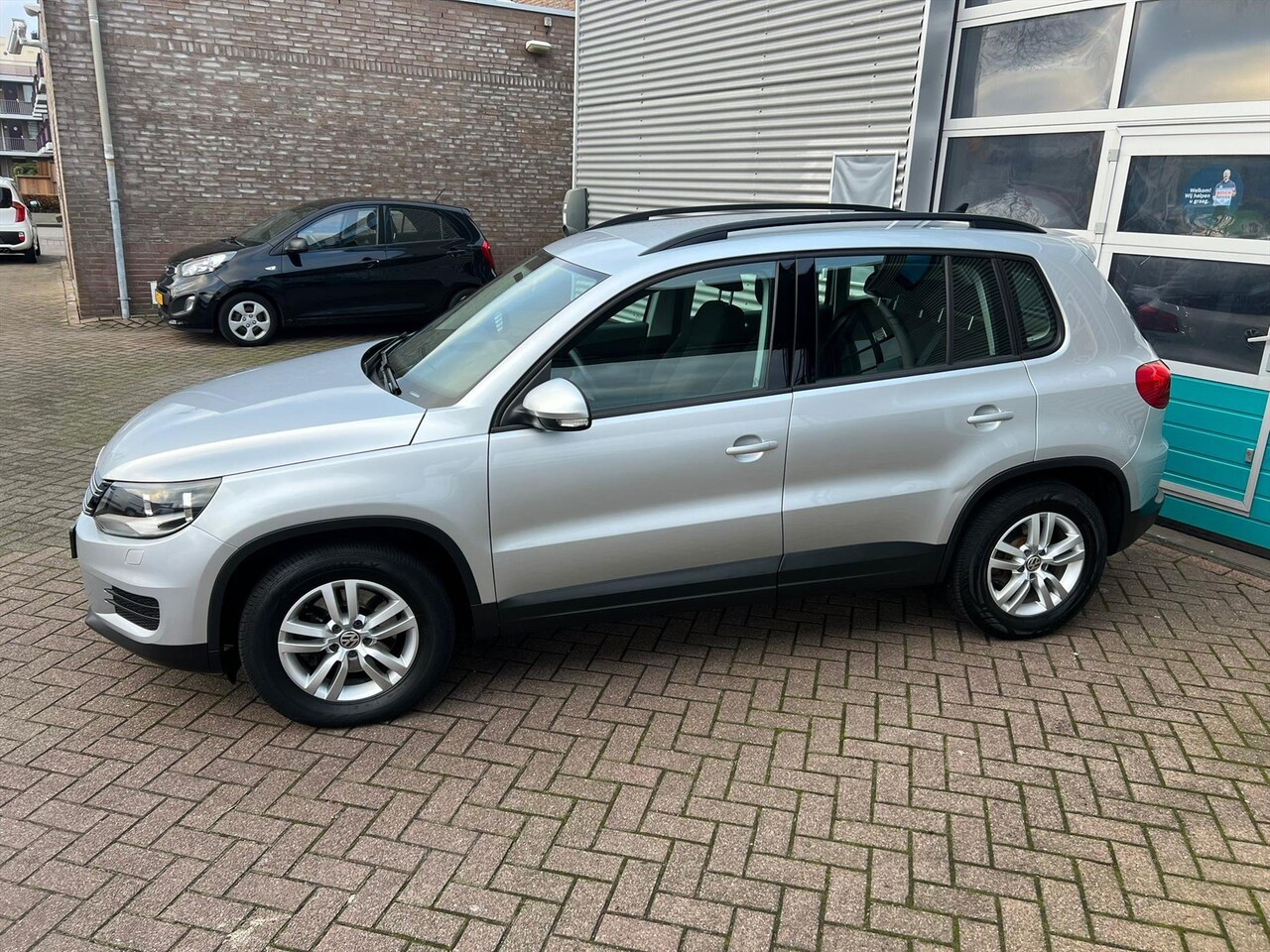 Volkswagen Tiguan - 1.4 TSI 122pk BlueMotion Technology Sport &amp; Style - AutoWereld.nl