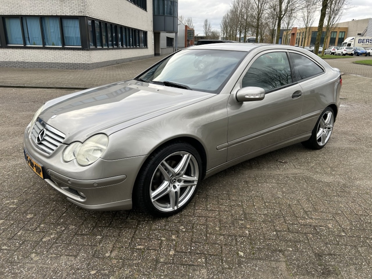 Mercedes-Benz C-klasse Sportcoupé - 180 K. Class AUT/PDC/CLIMA/CRUISE/NAP! - AutoWereld.nl