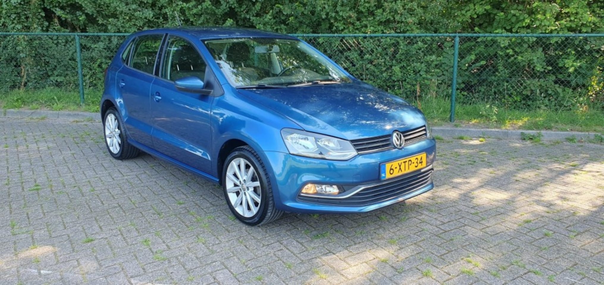 Volkswagen Polo - 1.2 tsi 5drs/Automaat/camera/trekhaak - AutoWereld.nl