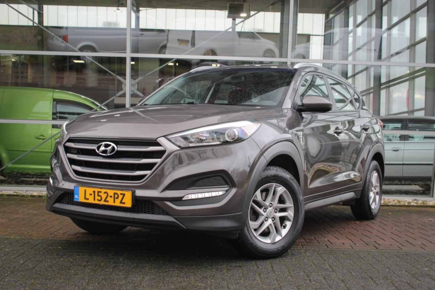 Hyundai Tucson - 1.6 GDi Comfort | Navi | Achteruitrijcamera | Stoelverwarming | - AutoWereld.nl