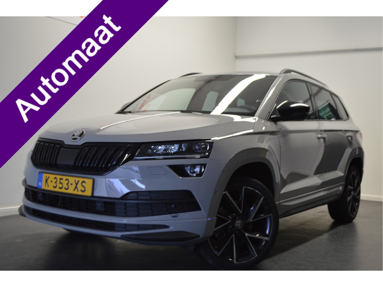 Skoda Karoq - 1.5 TSI ACT Sportline Business 1.5 TSI ACT Sportline Business , LED KOPLAMPEN , NAVI , A UITRIJ CAM , ST+STUUR VERW , - AutoWereld.nl