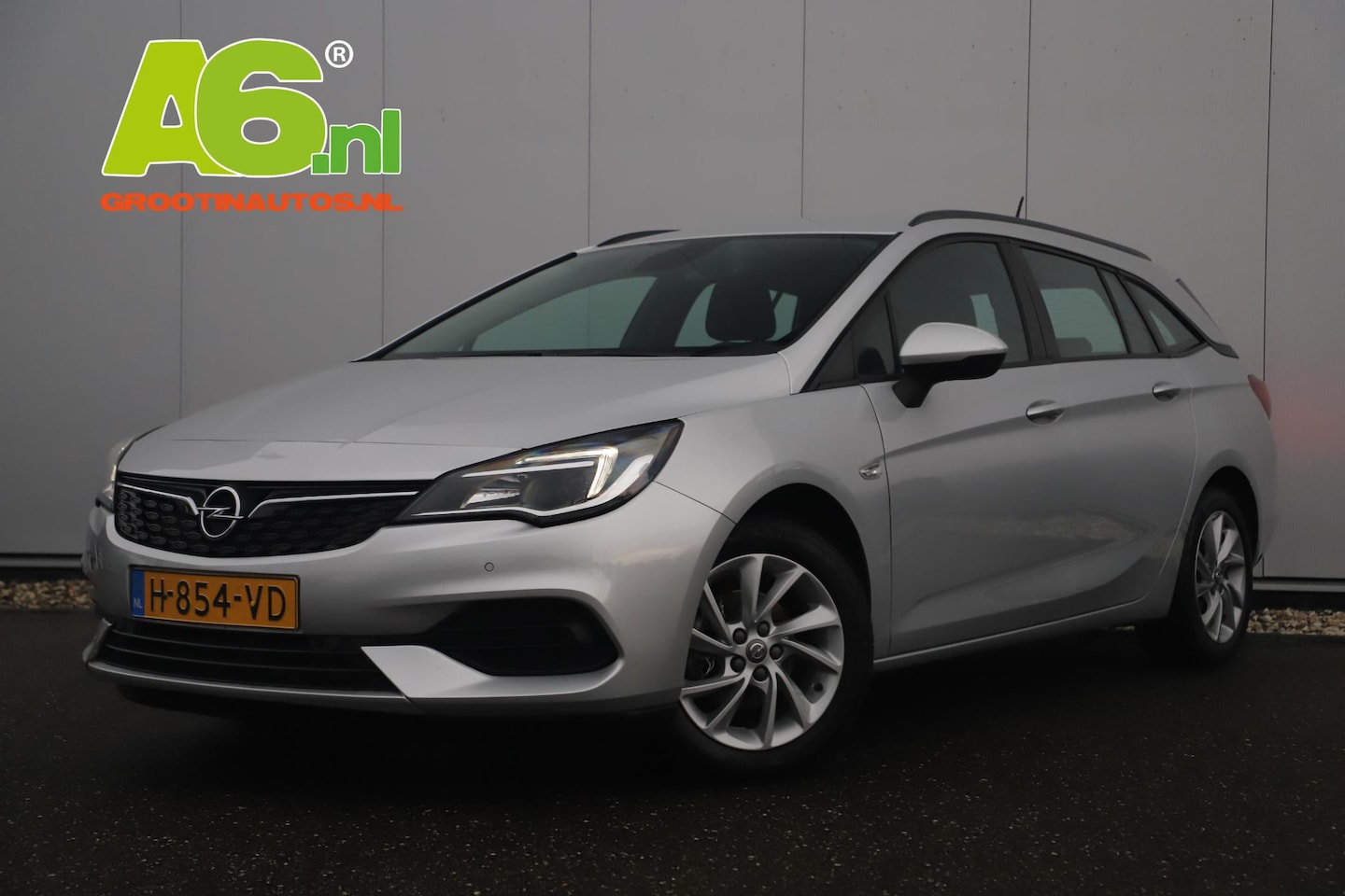 Opel Astra Sports Tourer - 1.2 Edition 131PK Trekhaak Navigatie Carplay Android 16 inch LMV Clima Cruise Parkeersenso - AutoWereld.nl