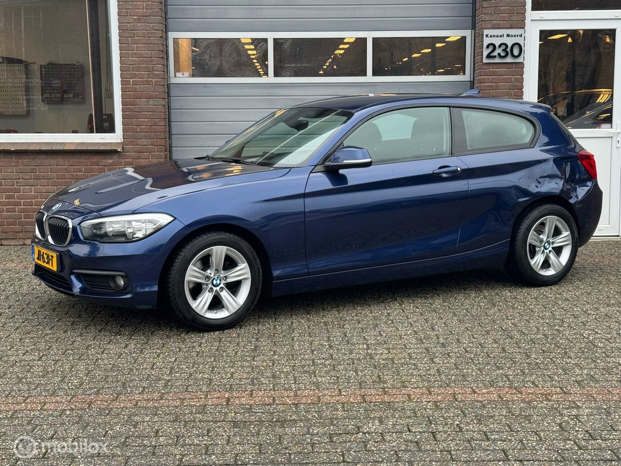 BMW 1-serie - 118i LCI AUT NAVIGATIE/PDC/AIRCO/CRUISE - AutoWereld.nl