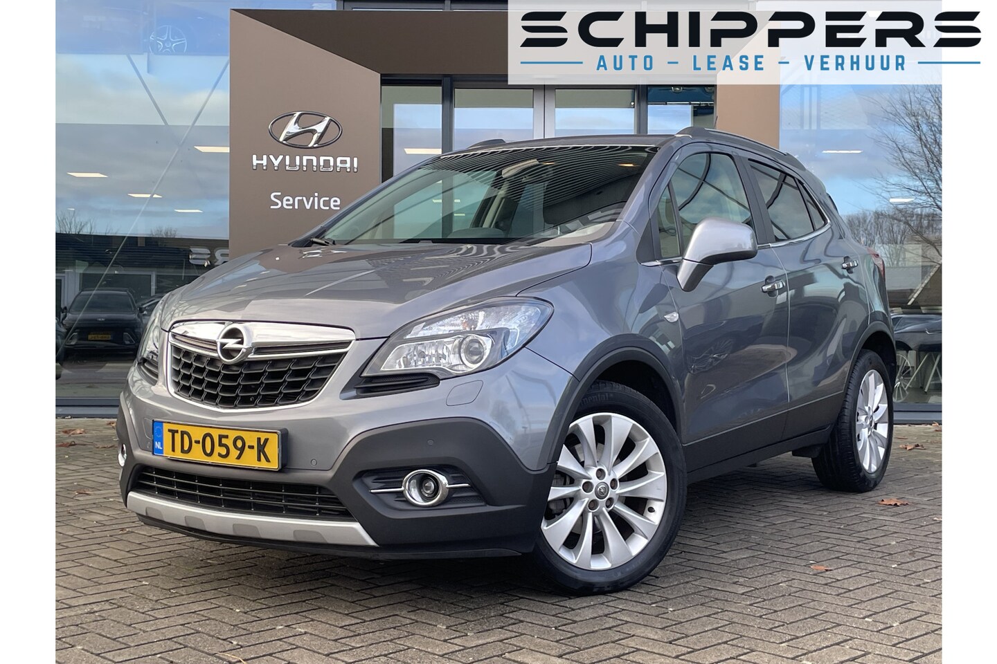 Opel Mokka - 1.4 T Cosmo 4x4 | Schuif-kanteldak - AutoWereld.nl