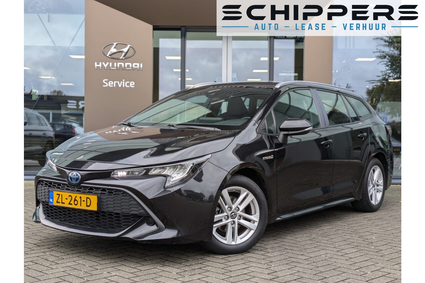 Toyota Corolla Touring Sports - 1.8 Hybrid Active | Navigatie - AutoWereld.nl