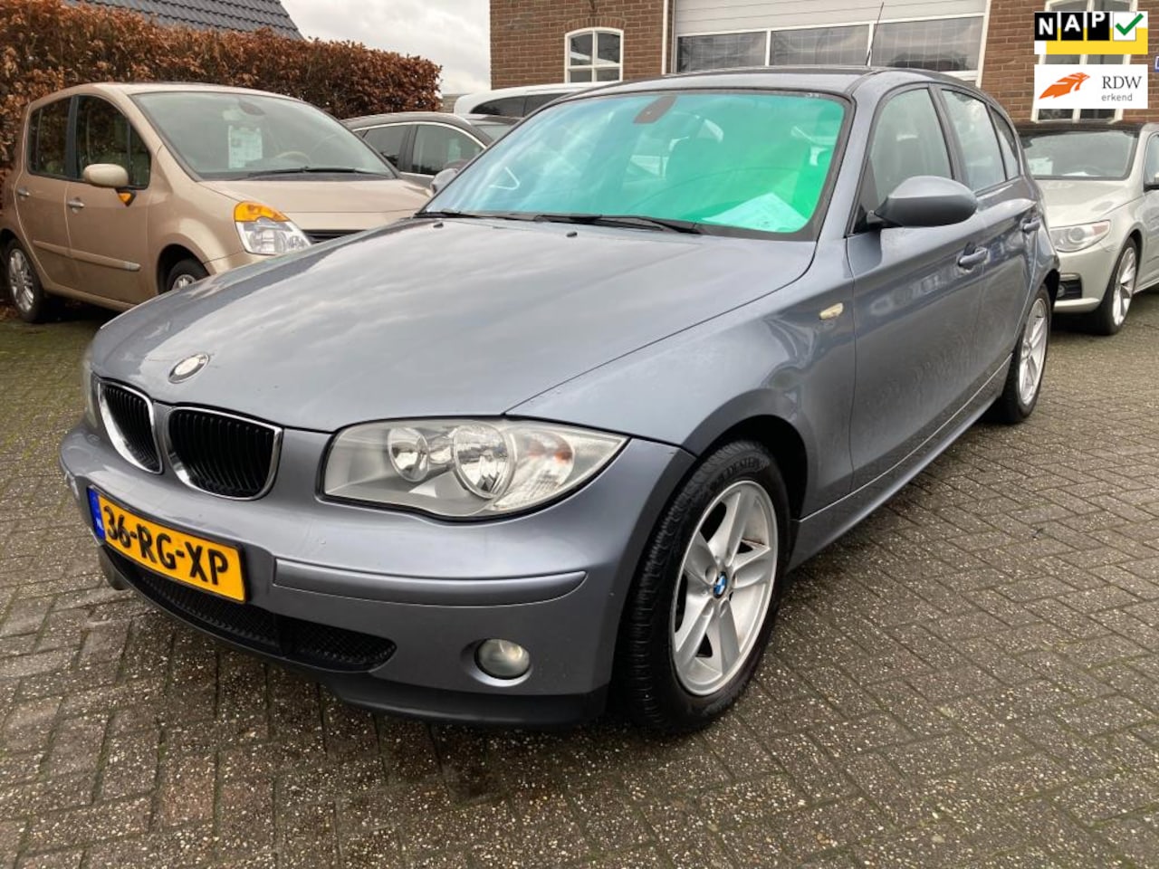 BMW 1-serie - 118i High Executive Bj 2005, Clima, Cruise, Navi , inruil is mogelijk - AutoWereld.nl