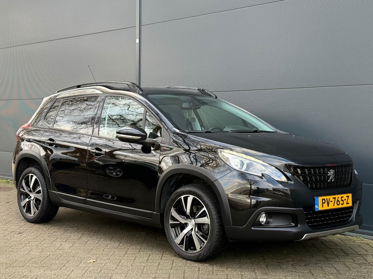 Peugeot 2008 - 1.2 PureTech GT-line TREKHAAK | PDC | PANO | NAVI | NWE APK - AutoWereld.nl