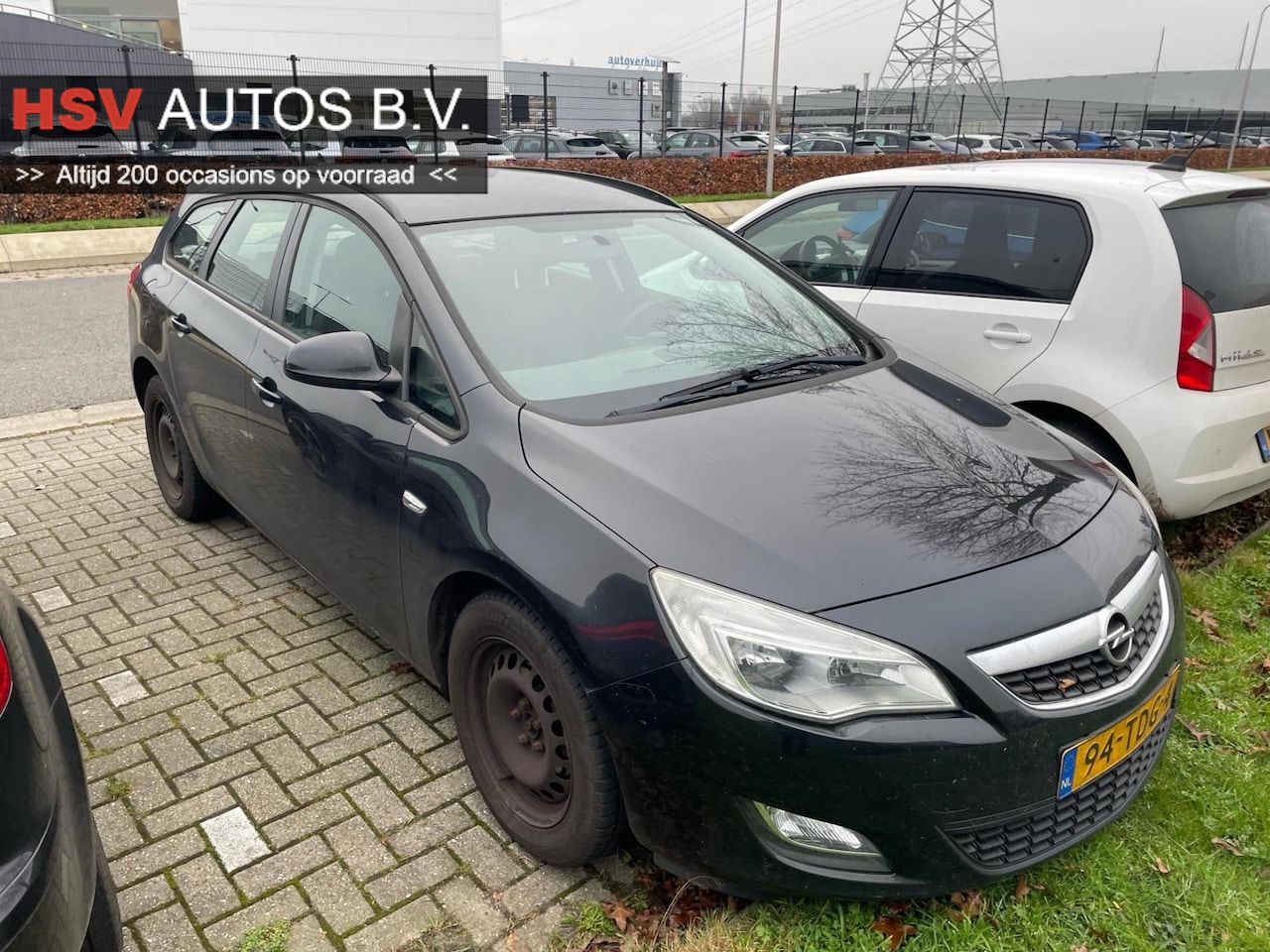 Opel Astra Sports Tourer - 1.3 CDTi S/S Business Edition navi airco - AutoWereld.nl