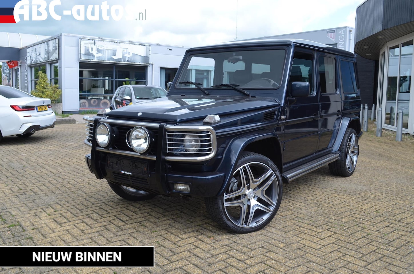 Mercedes-Benz G-klasse - 320/V6 LPi / 22" AMG / 9 persoons - AutoWereld.nl