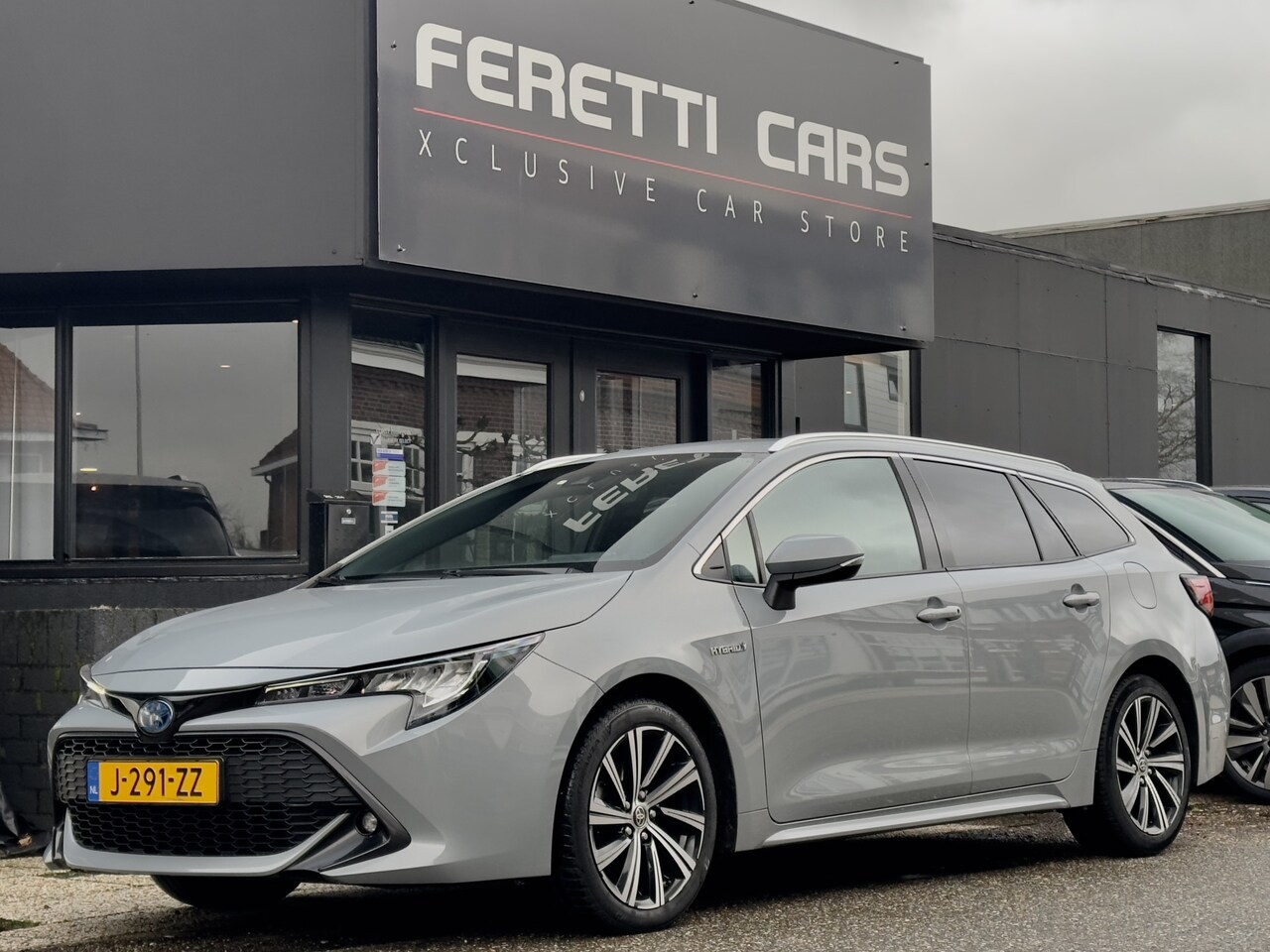 Toyota Corolla Touring Sports - 1.8 HYBRIDE PLUS AUTOM LEDER NAVI CAMERA LED LMV PDC - AutoWereld.nl