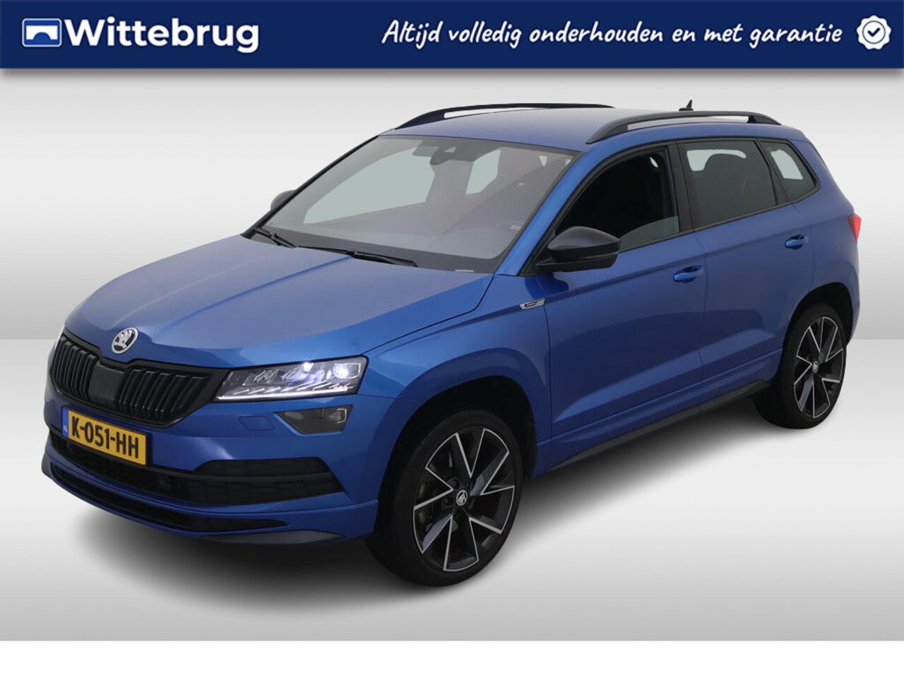 Skoda Karoq - 1.5 TSI 150pk ACT Sportline Business Comfort DSG Automaat Navigatie /Parkeersensoren / LED - AutoWereld.nl