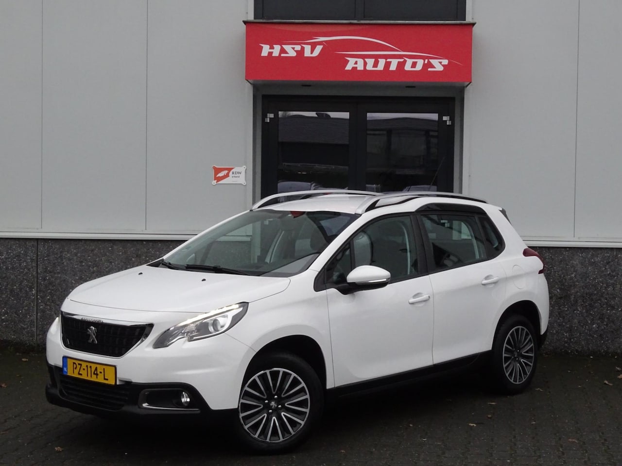 Peugeot 2008 - 1.2 PureTech Blue Lion navi LM airco org NL - AutoWereld.nl