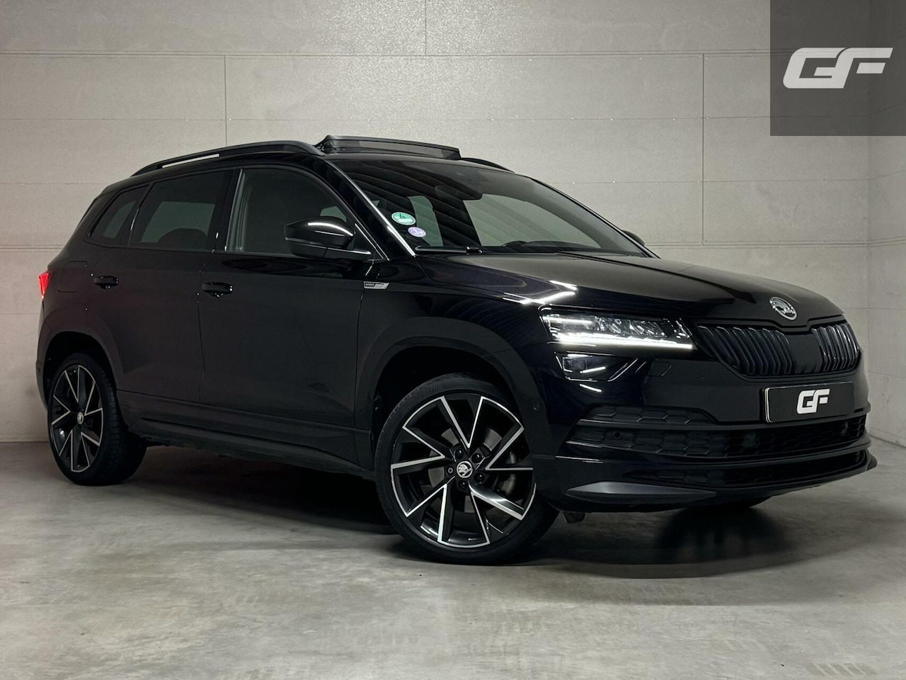 Skoda Karoq - 1.5 TSI ACT Sportline Pano Virtual Sfeer Trekh. - AutoWereld.nl