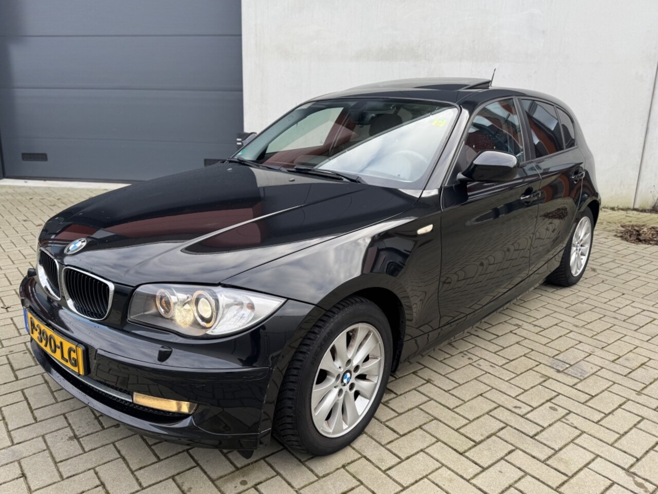 BMW 1-serie - 118i High Executive Dakje Navi Camera - AutoWereld.nl