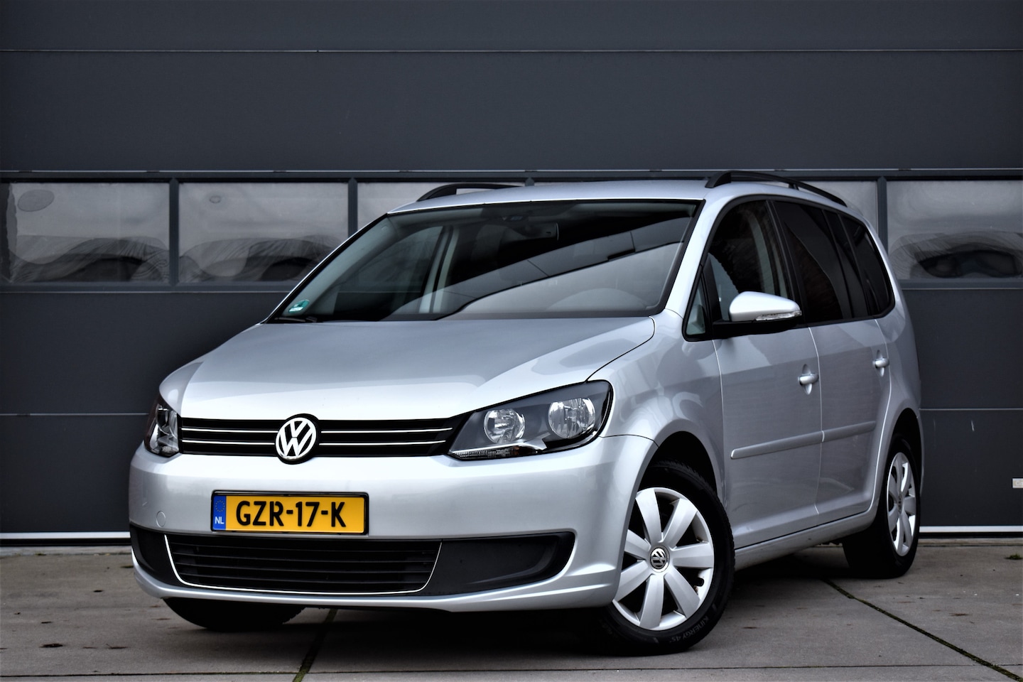 Volkswagen Touran - 1.4 TSI Comfortline 7p. Navi - Trekhaak - Cruise - Pdc - Clima - AutoWereld.nl