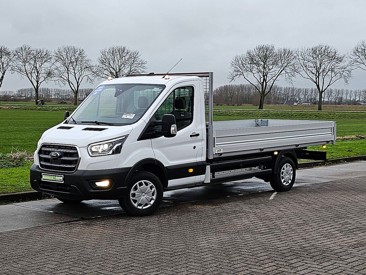 Ford E-Transit - 350 L4 Trend 68 kWh L4 OOpen-Laadbak XL Airco Automaat Navi Camera 100%0Elektrisch BPM-Vri - AutoWereld.nl