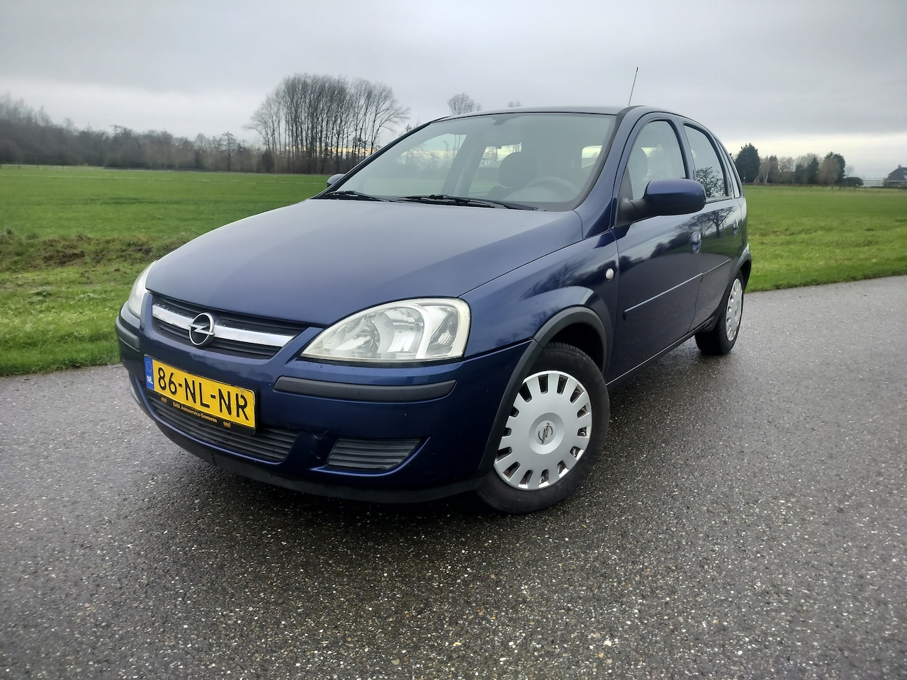 Opel Corsa - 1.2-16V Enjoy - AutoWereld.nl