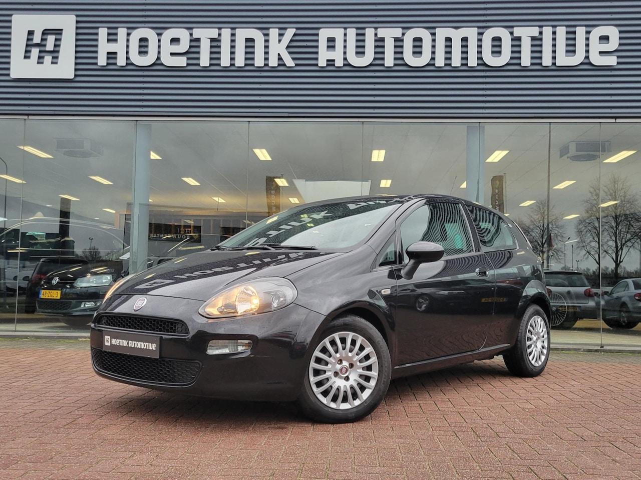 Fiat Punto Evo - 1.3 M-Jet Easy | Cruise | Airco | Bluetooth - AutoWereld.nl