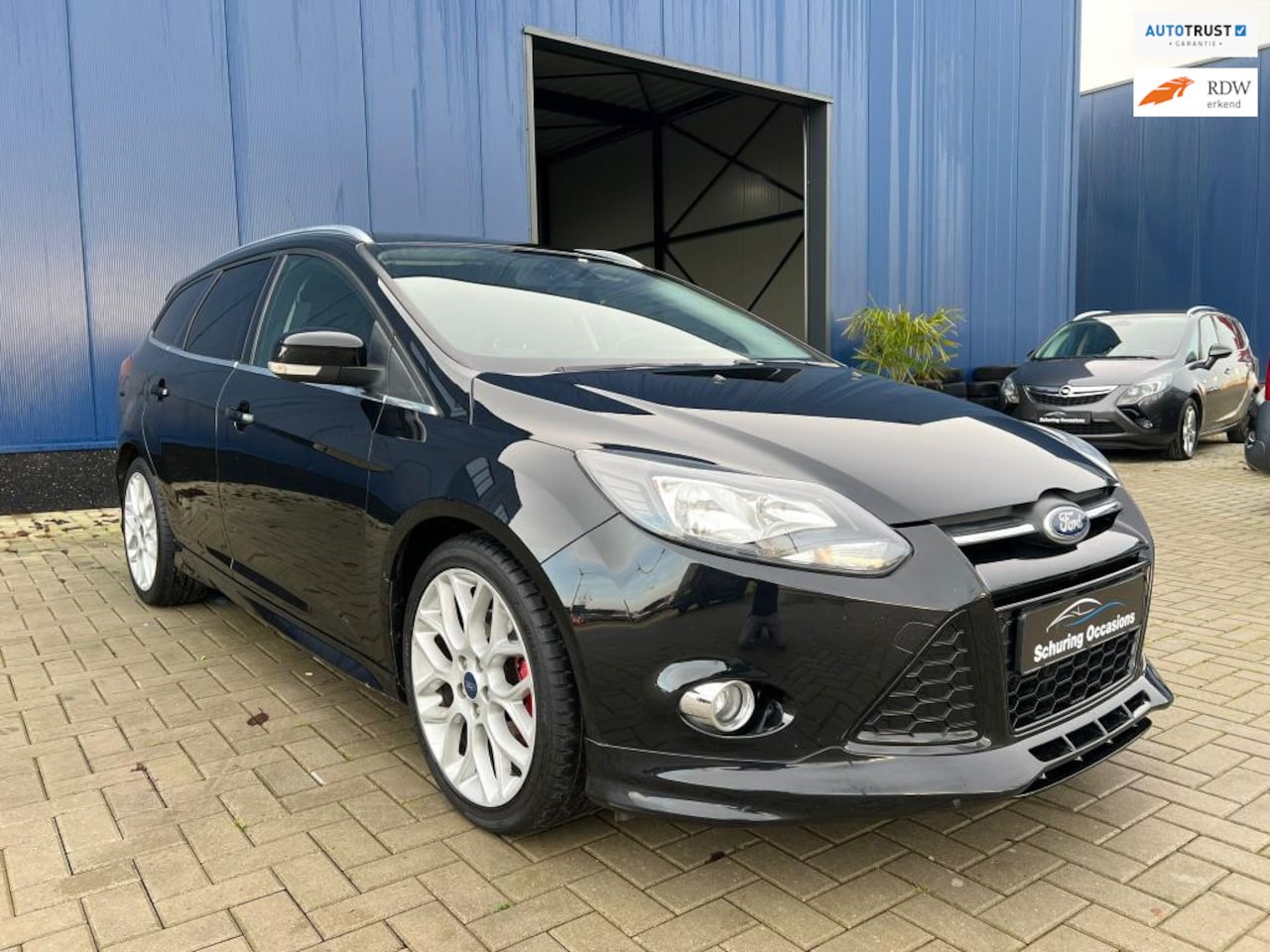 Ford Focus Wagon - 1.6 EcoBoost Titanium ST / 150PK / NAVIGATIE / ACHTERUITRIJCAMERA / PDC / STOELVERWARMING - AutoWereld.nl