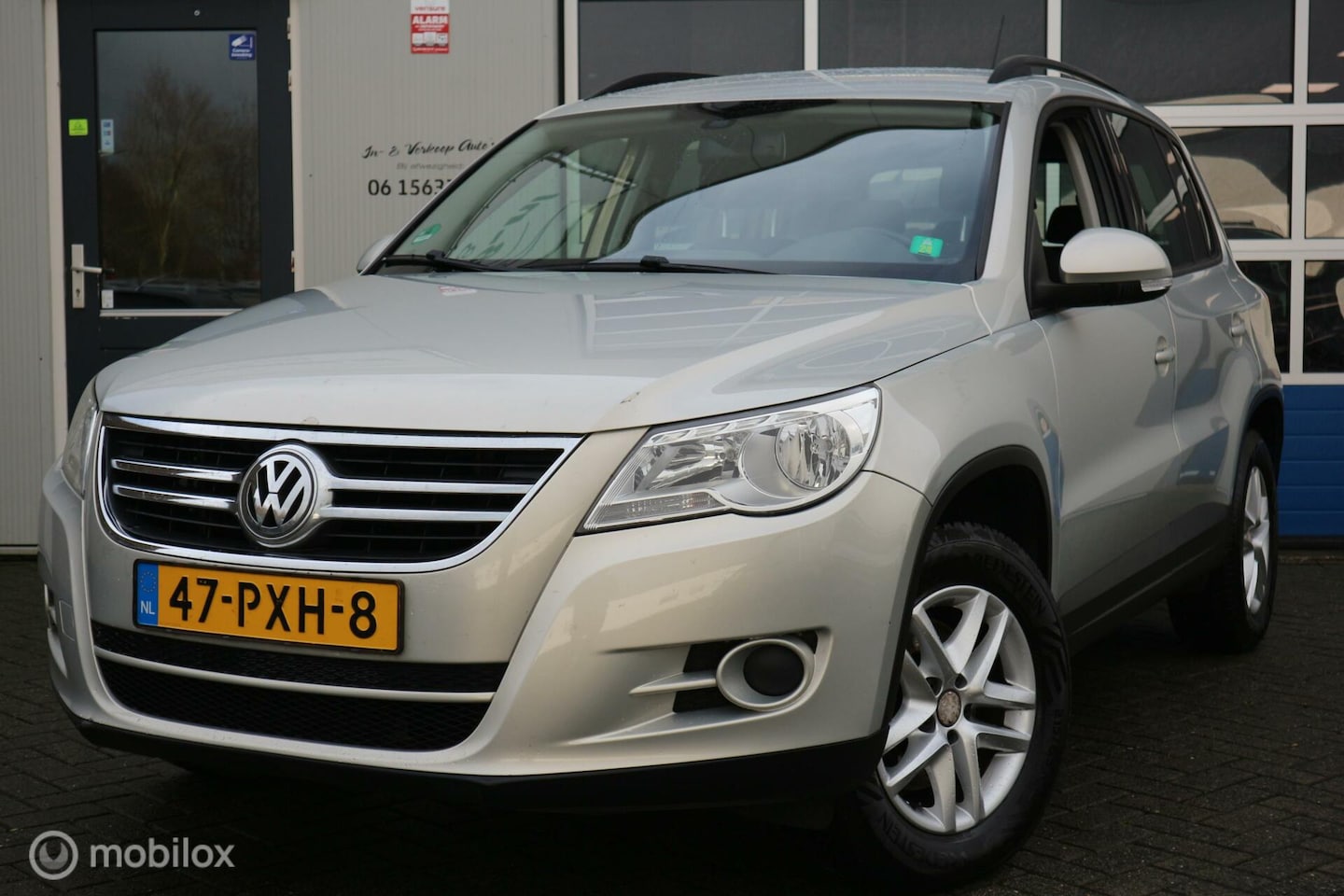 Volkswagen Tiguan - 1.4 TSI Comfort&Design ECC/NAVIGATIE/NAP - AutoWereld.nl