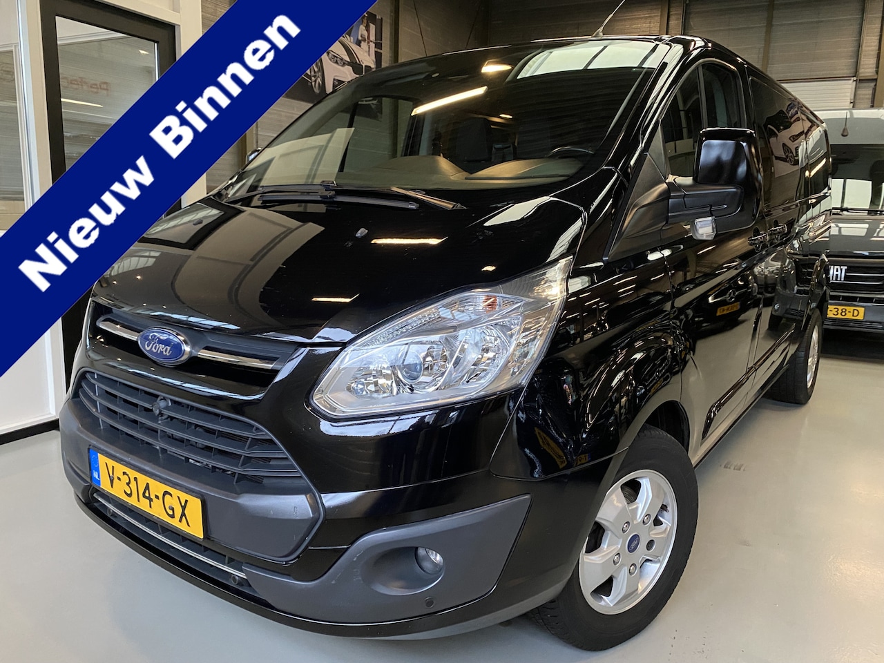 Ford Transit Custom - 290 2.0 TDCI L2H1 Limited DC Airco, Camera, Cruise, Navi - AutoWereld.nl