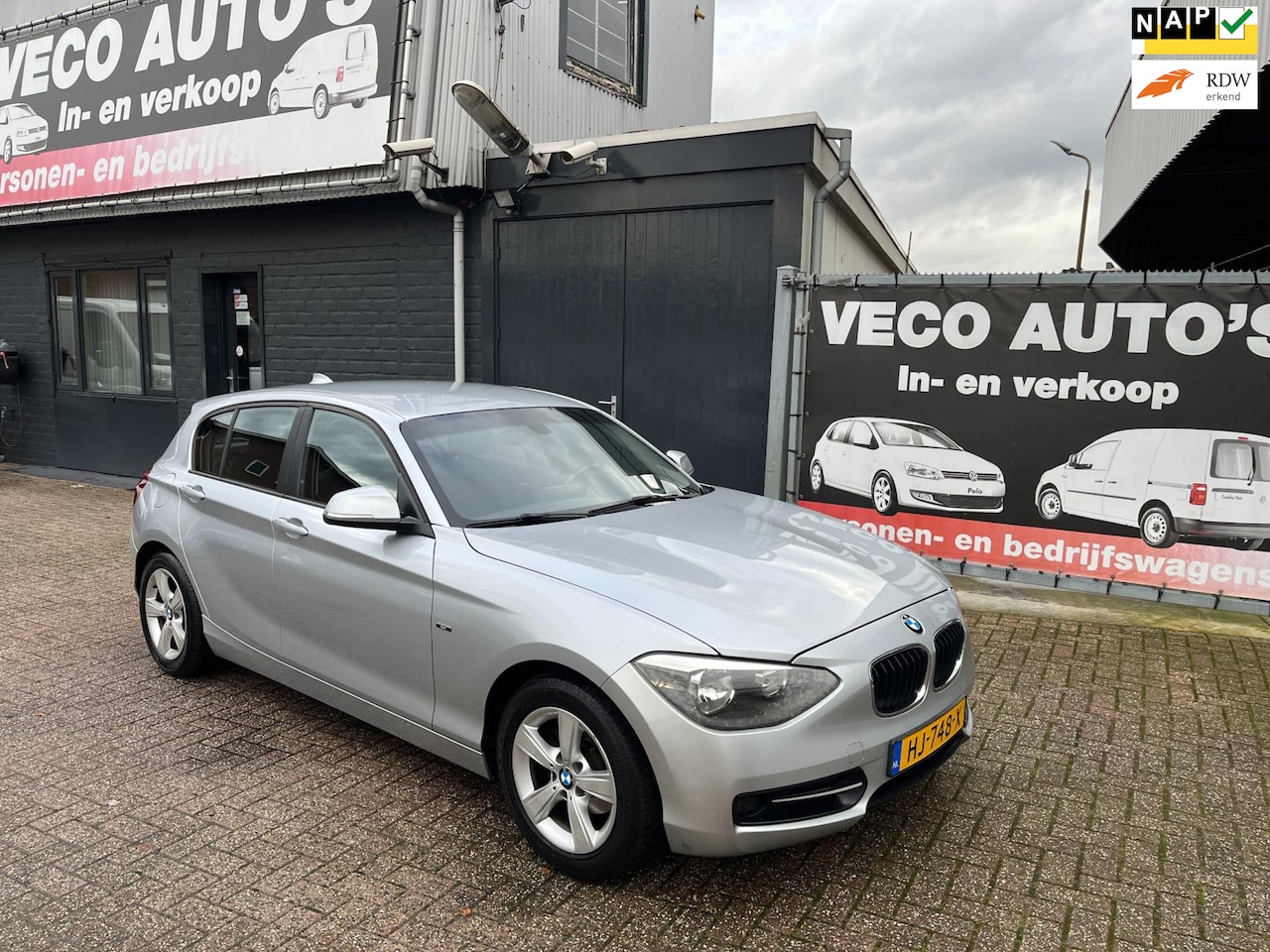 BMW 1-serie - 118d Executive Sport Line navi pdc ecc airco nieuwstaat dealer onderhouden - AutoWereld.nl