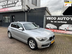 BMW 1-serie - 118d Executive Sport Line navi pdc ecc airco nieuwstaat dealer onderhouden