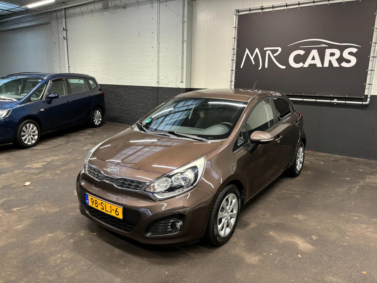 Kia Rio - 1.2 CVVT Plus Pack Airco. - AutoWereld.nl