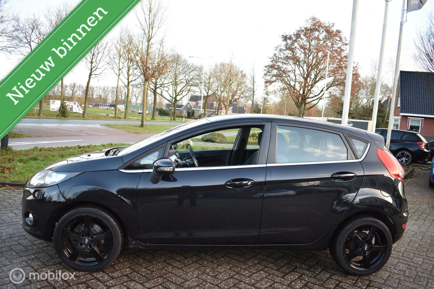 Ford Fiesta - 1.25 Titanium 1.25 Titanium 5DRS, Airco|Cruise|LM wielen! - AutoWereld.nl