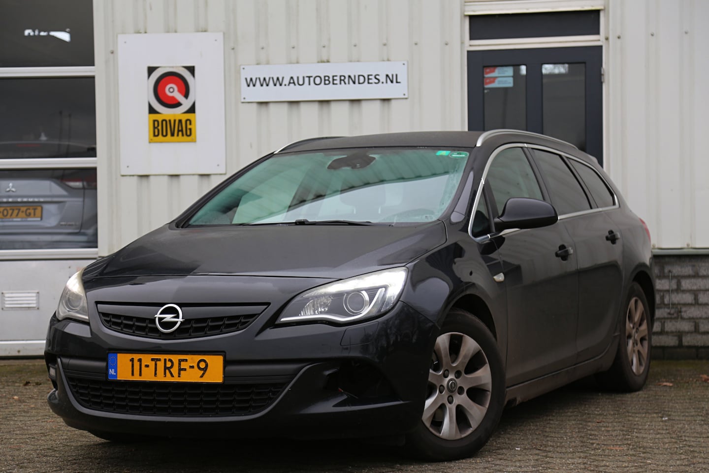 Opel Astra Sports Tourer - 2.0 CDTi Sport*NL-Auto*Perfect Onderh.*Trekhaak/Xenon/LED/Sportstoelen Leder/Stoelverw./Na - AutoWereld.nl