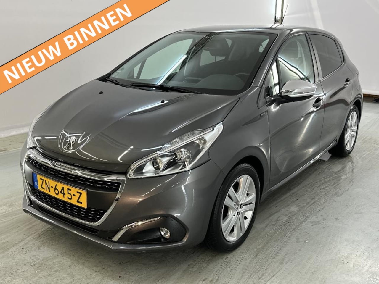 Peugeot 208 - 1.2 PureTech Signature [PDC ACHTER, NAVIGATIE, CRUISE CONTROL, AIRCO, NIEUWSTAAT] - AutoWereld.nl