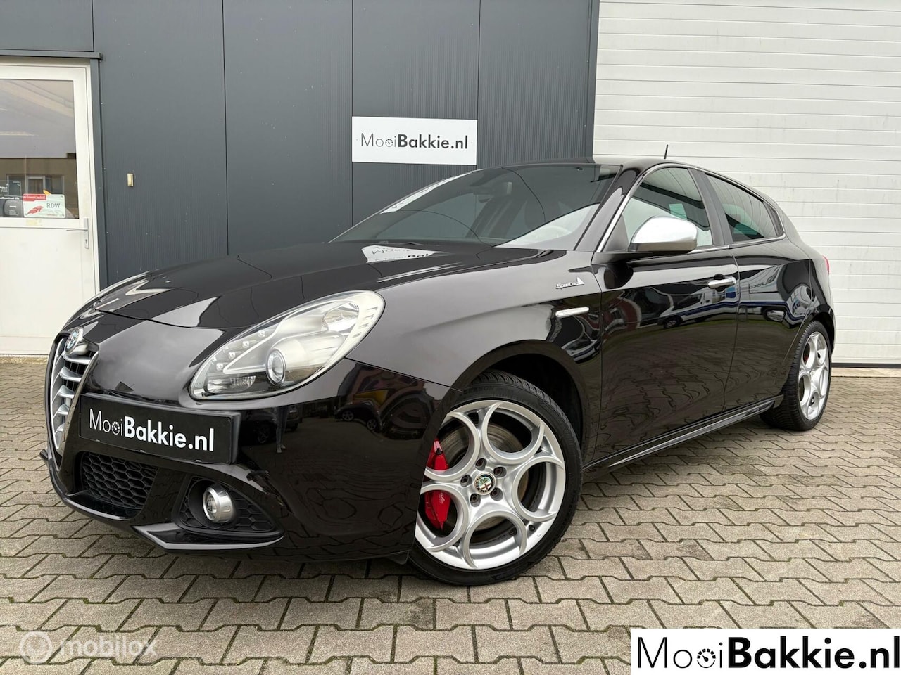 Alfa Romeo Giulietta - 1.4 T Distinctive Sportiva 18" / Clima - AutoWereld.nl