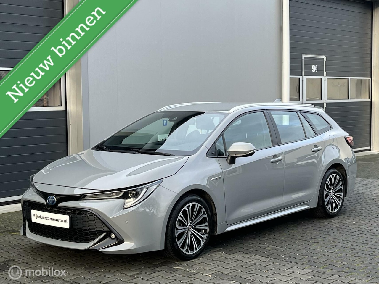 Toyota Corolla Touring Sports - 1.8 Hybrid Aut. Led, Trekhaak - AutoWereld.nl