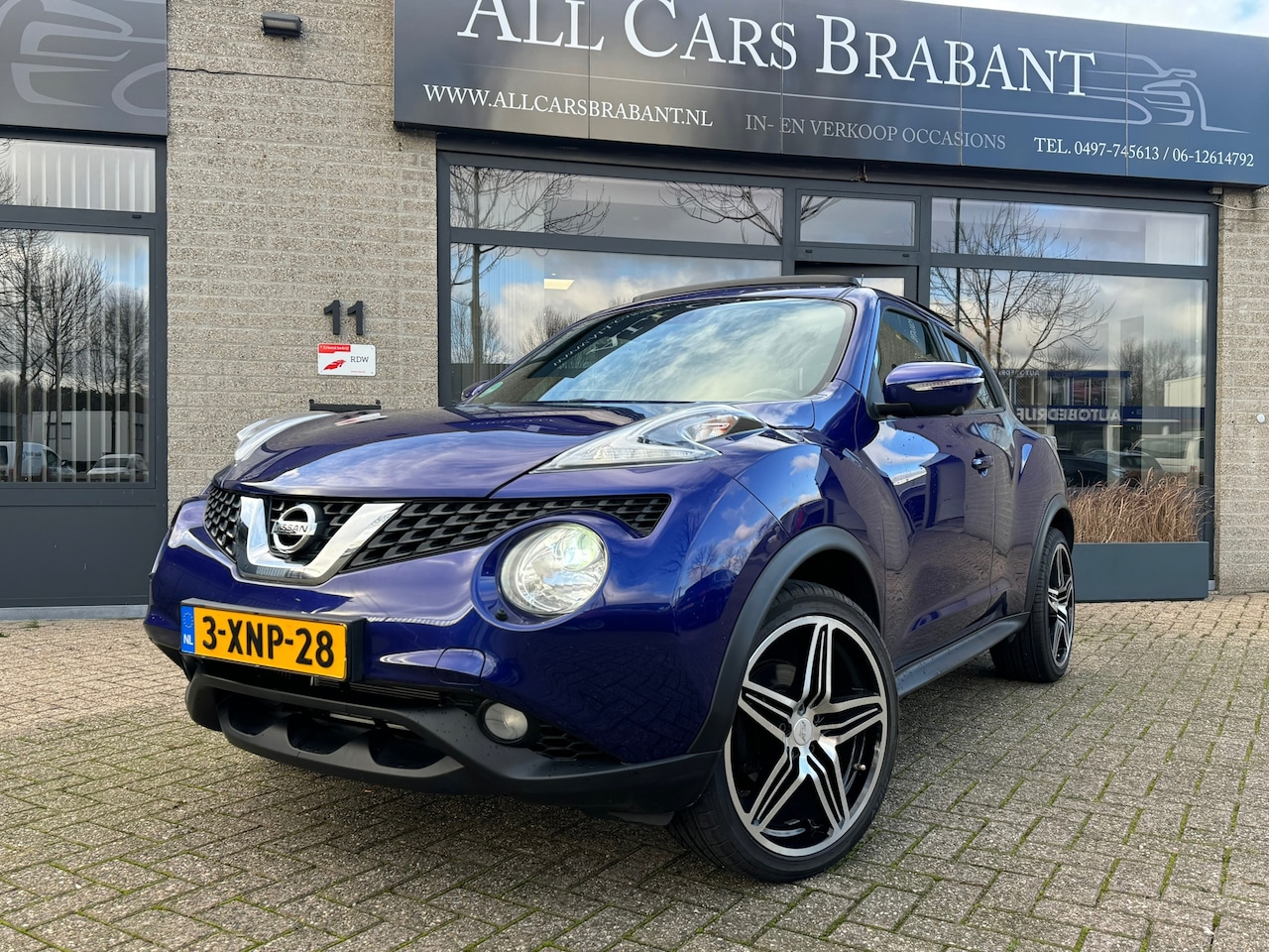 Nissan Juke - 1.2 DIG-T S/S Tekna / panorama / xenon / leder/ navi/ - AutoWereld.nl