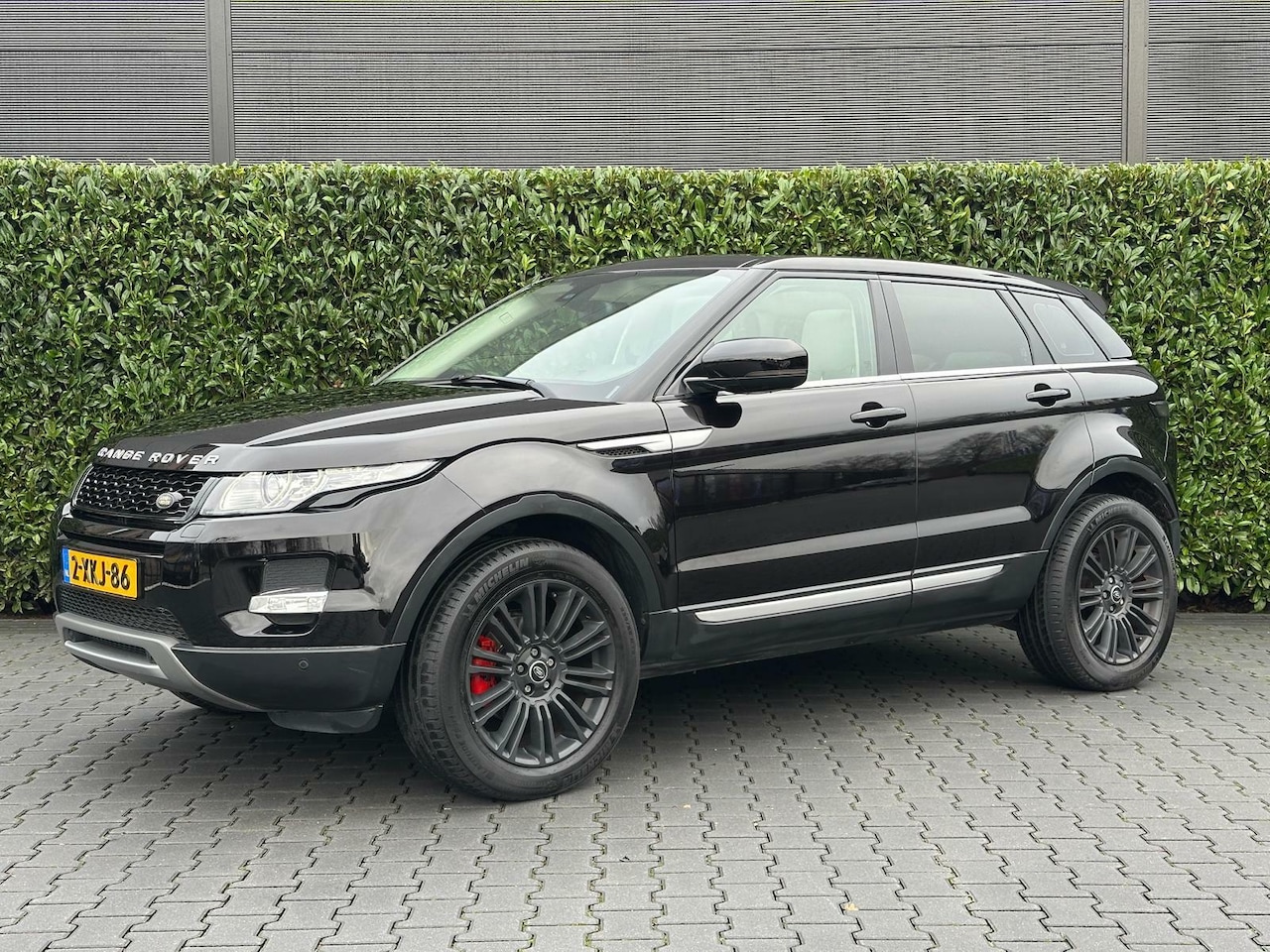 Land Rover Range Rover Evoque - 2.0 Si 4WD Prestige PANO, MERIDIAN, CRUISE, LEDER, CAMERA, XENON, LED, ECC-AIRCO, STOELVER - AutoWereld.nl