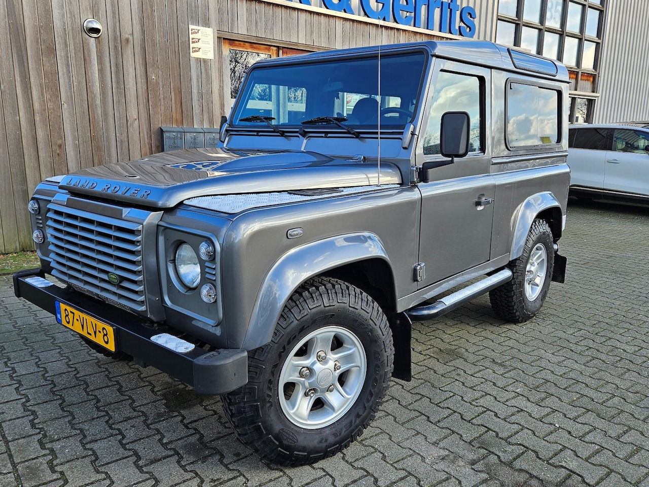 Land Rover Defender 90 - 2.4 TD SW XTech grijskenteken - AutoWereld.nl