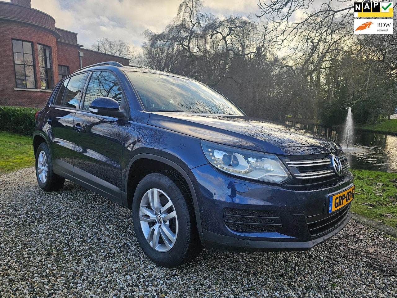 Volkswagen Tiguan - 1.4 TSI Sport&Style - AutoWereld.nl