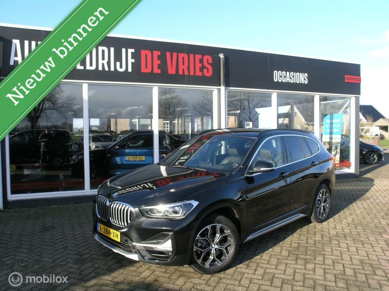 BMW X1 - sDrive20i Orange Edition Leder/HUD/Sportstoelen/18Inch - AutoWereld.nl