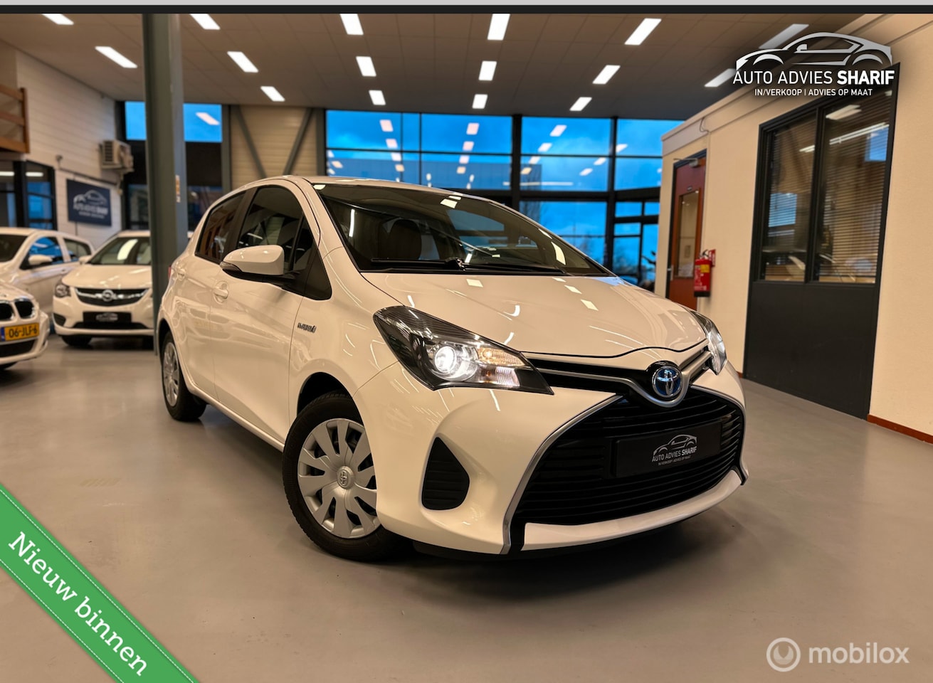 Toyota Yaris - 1.5 Hybrid Comfort Camera|Stoelverwarming|Airco - AutoWereld.nl