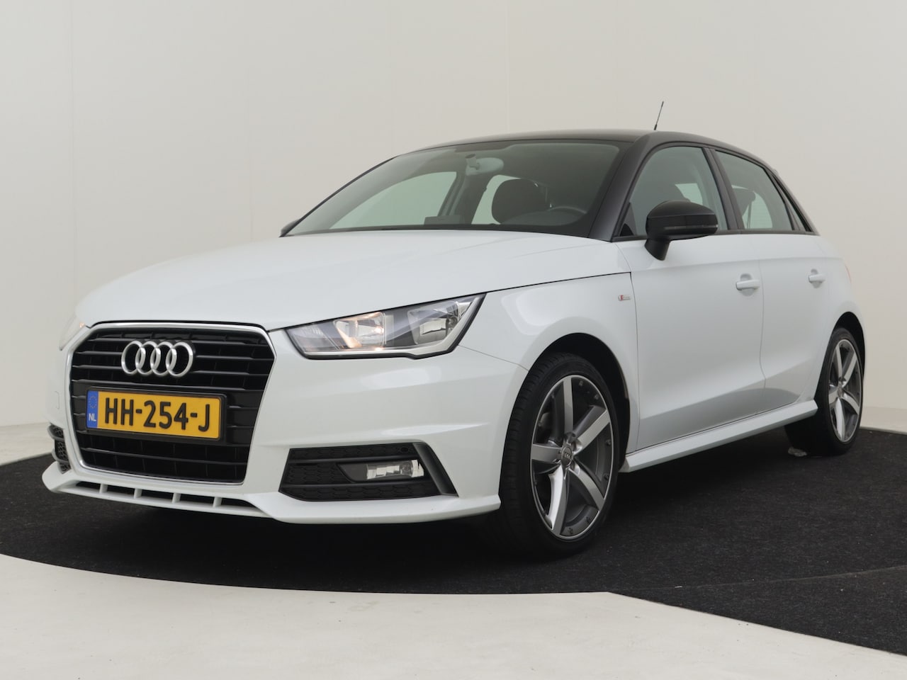 Audi A1 Sportback - 1.0 TFSI 96 pk Sport | 100% Dealeronderhouden | S-line exterieur | Cruise control | Naviga - AutoWereld.nl