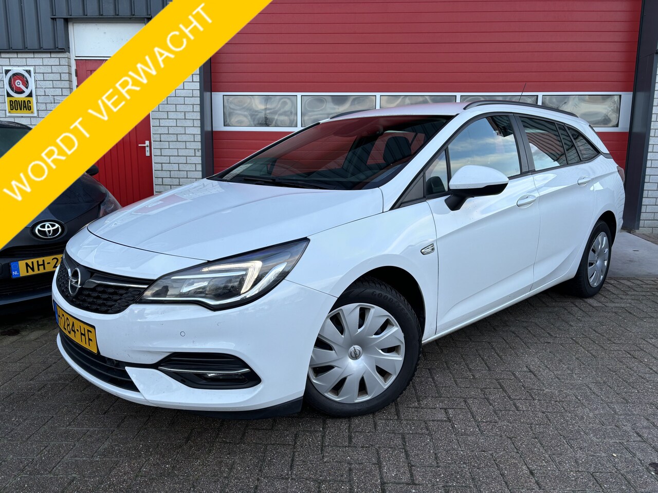 Opel Astra Sports Tourer - 1.2 146PK Business Edition NAVI / CLIMA / PDC / BLUETOOTH / CARPLAY / CRUISE / NL-AUTO - AutoWereld.nl